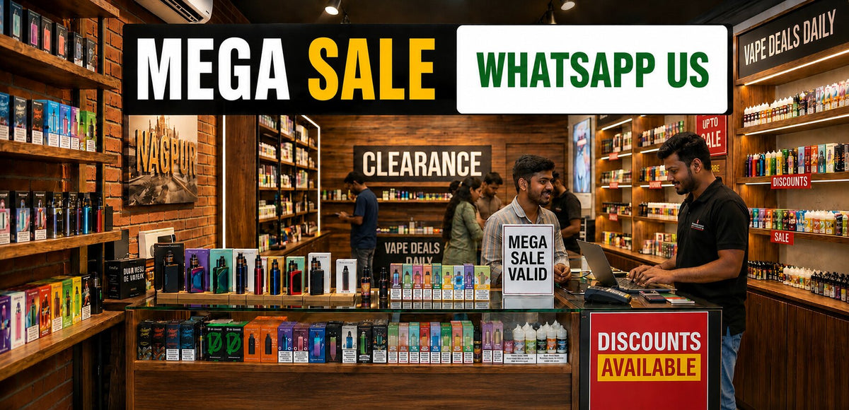Promotional banner for a vape shop sale, featuring a busy retail store interior with shelves of vape products, customers, and a staff member at the counter. Large text overlays read 'MEGA SALE', 'WHATSAPP US', 'CLEARANCE', and 'DISCOUNTS AVAILABLE'.